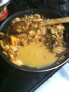 Once rice is nicely toasted, push ingredients to one side of the pan.  Add egg and scramble.  Once almost fully cooked, incorporate together.