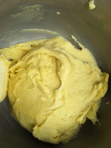 Should have a glossy finish.  Fill pastry bag or if you're lazy, gallon Ziploc.  Cut end and form either, long for eclairs, round hives for pate chou or boil water for gnocchi.