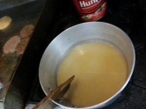 Add 1 part chicken broth and 2 parts water.  Cook till rice is about to break apart.  