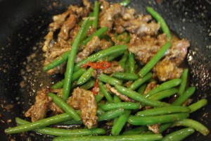 Add beef and just toss till fully coated.  Add 1 tsp. of sesame oil and serve.