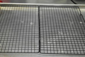 Grease sheet pan and racks.