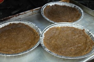 Press into pie pans.