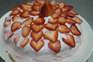 Gotta love the strawberries sliding off the frosting.