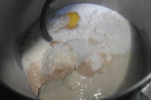 Add egg, rue and milk.