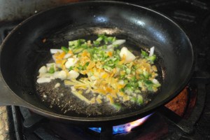Heat pan on high and add oil.  Stir fry vegetables.  Add sauce.