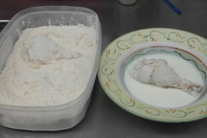Flour, buttermilk and flour again.
