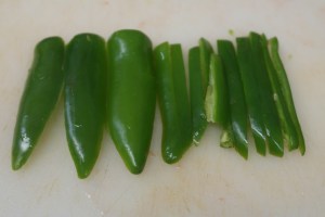 Seed and chop jalapenos.