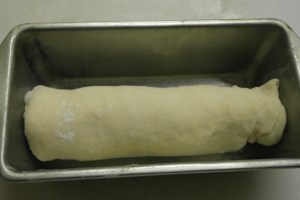 Into greased loaf pan.