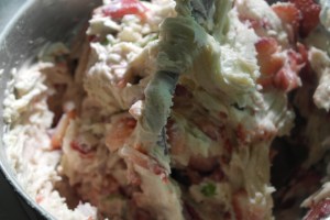 Alternate flour with sour cream. Fold in strawberries.