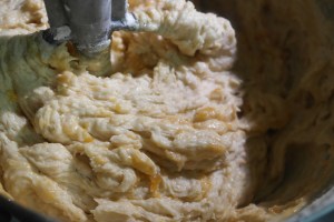 Alternate flour and apricot puree into batter.