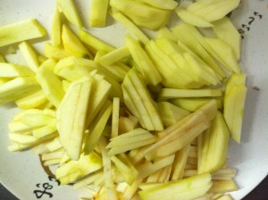 Peeled and cut apples into matchsticks.