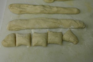 Roll into logs and cut into fifths again.