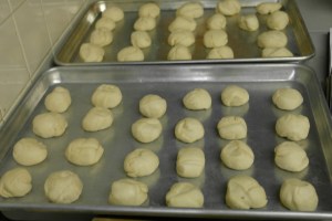 Roll into small balls.  You should have 50.  Cover and proof again for 30  minutes.