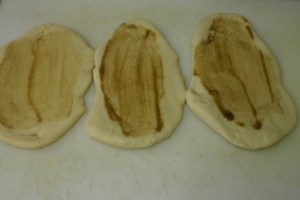 Roll dough out again and brush with browned butter and sprinkle sea salt.