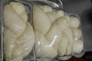 After 1 hour, should proof above the loaf pan. Egg wash and wrap with foil leaving plenty of room for bread to rise.