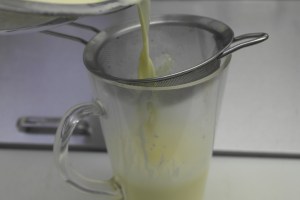 Strain into a pitcher or a vessel that easily pours.