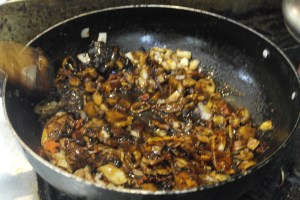 Toss and continue to cook.  Add sugar.