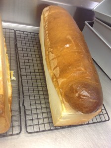Traditional pullman uses a lid to keep the bread square but I prefer the super tall bread.