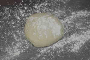 After dough has rested overnight move to floured surface.