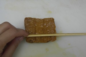 Using chopstick, GENTLY roll.