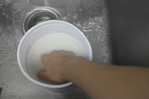 Fill again and 50 strokes gently rub the rice with the meaty part of your palm.