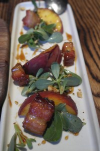 Grilled Peaches with Pork Belly and toasted hazelnuts.