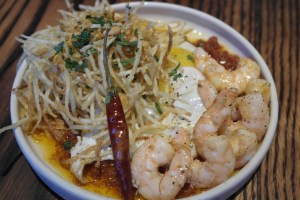 Sunny Side Up Eggs - with Shrimp, crispy potato and Chorizo dressing.