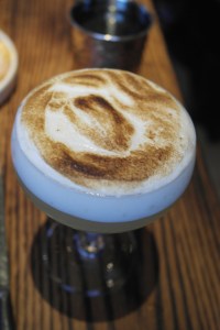 The Sun Never Sets - Licor 43, Tequila 123 Anejo, Lime, Fresh Pressed Pineapple Juice, Mezcal - Pineapple Espuma Brulee.