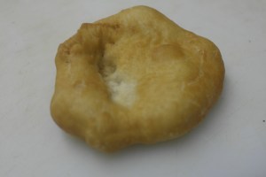 Sprinkle sugar or top with sour cream and garlic or dill.