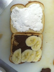 Wonder bread with nutella on one side and marshmallow creme on the other. Stuffed with bananas.