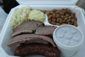 I got 3 sides and 2 meats for $9.  Brisket, sausage, slaw, potato salad and beans.