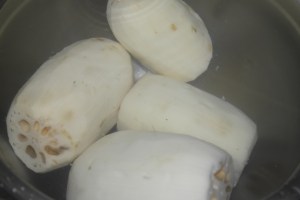 Peel and soak in water with vinegar.