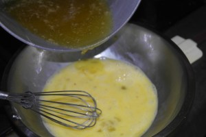 Slowly mix with eggs.