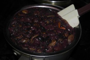 I had to use two different strainers because the first was too fine.  Use back of a large spoon to squeeze.