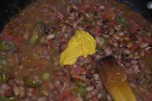 Spicy mustard, apple cider vinegar and worcestershire sauce.  