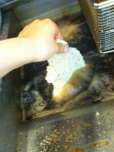 Carefully drop in fryer.